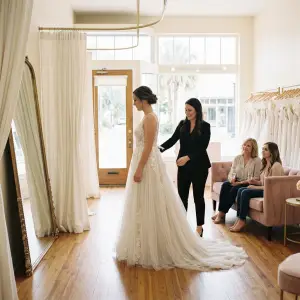Bride at private appointment in St. Pete bridal boutique with empty salon around her